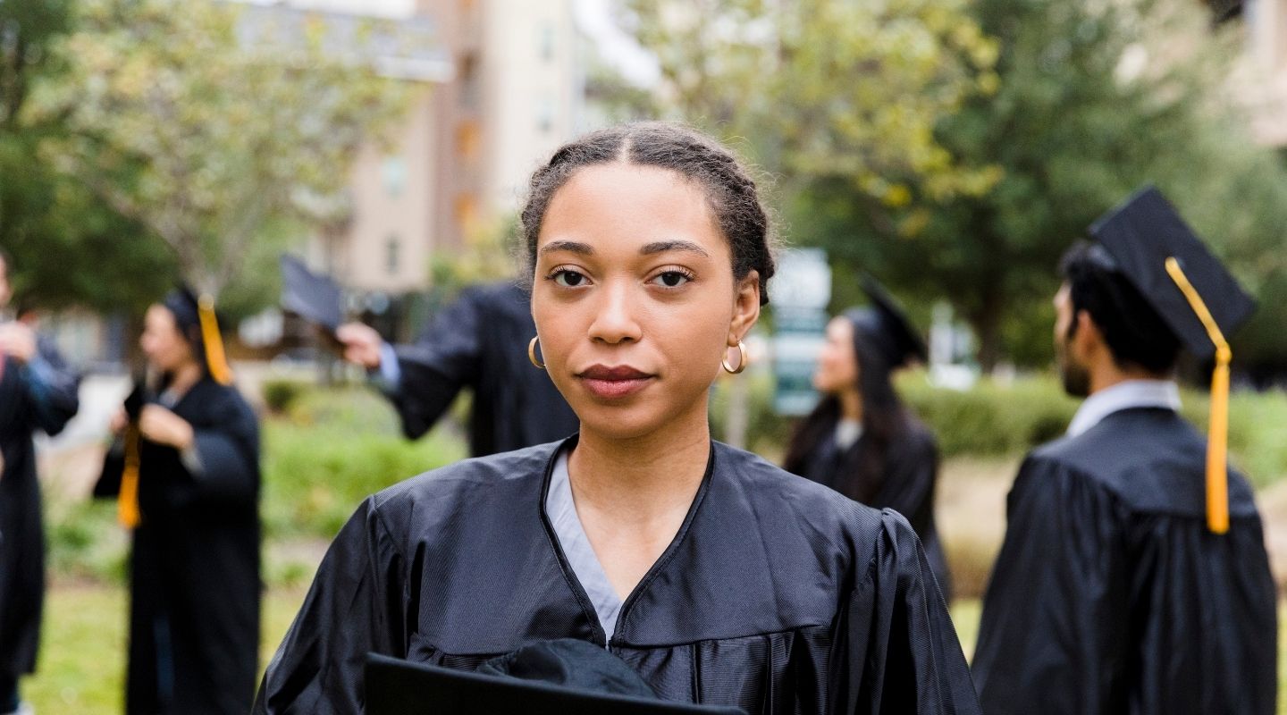 Young woman at commencement at risk of post-college depression